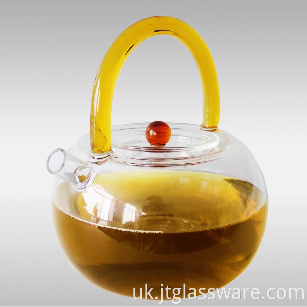 glass teapot with kind of handle